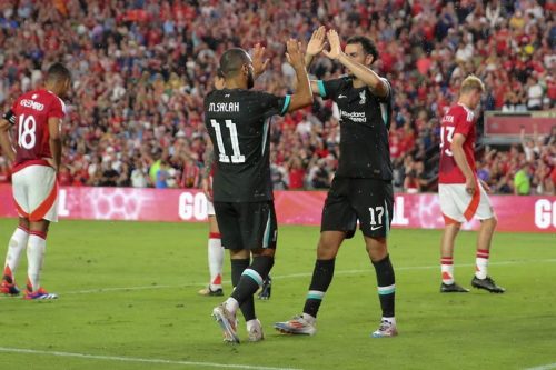 Selebrasi Mohamed Salah dan Curtis Jones dalam laga uji coba pramusim antara Manchester United vs Liverpool, Minggu (4/8). (ist)