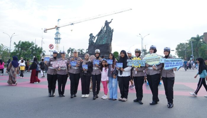 Gimik Tertib Lalu Lintas di CFD, Operasi Zebra Lancang Kuning Bawa Pesan Pilkada Damai