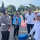 Polwan Ditlantas Polda Riau saat menyapa warga di kawasan Car Free Day Pekanbaru.(ist)
