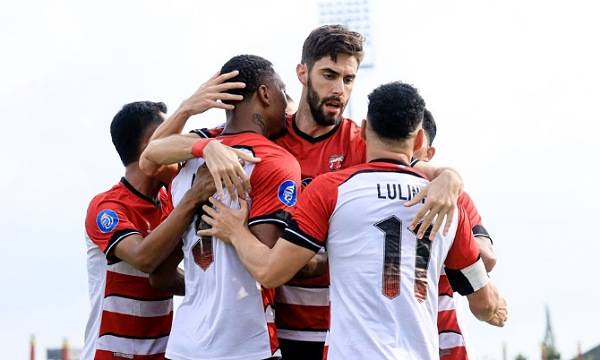 Momen pemain Madura United melajukan selebrasi usai cetak gol.(ist)