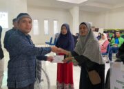 Peringatan HUT ke-24, Baznas Bukittinggi Potong Tumpeng dan Distribusikan Zakat