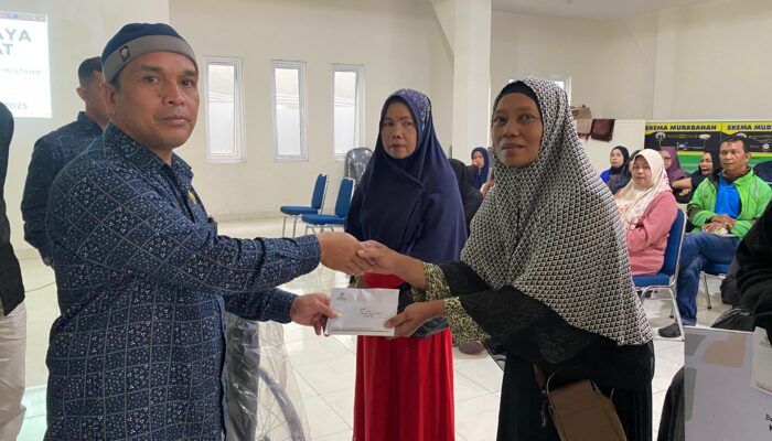 Peringatan HUT ke-24, Baznas Bukittinggi Potong Tumpeng dan Distribusikan Zakat