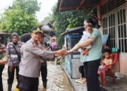 Polres Rokan Hulu Salurkan Bantuan bagi Warga Terdampak Banjir