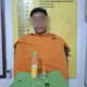 Penampakan pelaku Wahyu saat diamankan di Mapolsek Batang Gansal. (Ist)