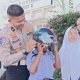 Kompol Pauzi memberikan edukasi tertib berlalu lintas kepada siswa SMPN 37 Pekanbaru dalam program Police Go to School, Rabu (18/6/2025). (Ist)
