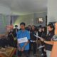 Suasana rekonstruksi pembunuhan berantai yang menghadirkan tersangka di bawah pengawalan ketat polisi. (Foto: ist)