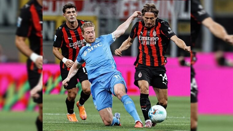 Luka Modric saat mencoba melewati salah satu pemain Napoli.(ist)