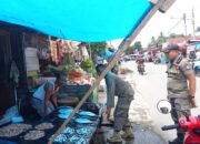 Satpol PP Jaga Ketertiban Pasar Pagi Parak Laweh, Kemacetan Panjang Kini Teratasi