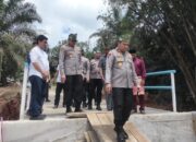 Kapolda Riau Tinjau Pembangunan Jembatan Merah Putih Presisi di Kampar