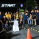 Kabid TIK Polda Riau, Kombes Pol. Andi Yul Lapawesean Tenri Guling (kiri) saat duel dengan Ditreskrimum Kombes Pol M Hasyim Risahondua (kanan) di Jalan Thamrin Pekanbaru.(ist)