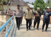 Kapolres Kampar Dampingi Bupati Tinjau Kesiapan Jembatan Merah Putih Presisi di Tambang, Pastikan Aman Jelang Peresmian Kapolri