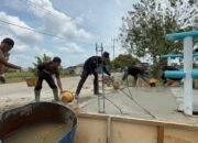 Polri dan Warga Kompak Bangun Jembatan Merah Putih Presisi di Sungai Mandau