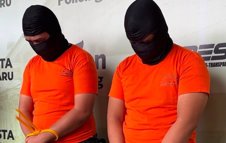 Terungkap! Ini Identitas Dua Pelaku Penipuan Online Rp300 Juta di Pekanbaru