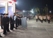 Api Obor Menyala, Kapolres Kampar Serukan Semangat Persatuan di HUT RI