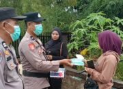 Masker Dibagikan di Batu Hampar, Polisi Ingatkan Warga Waspadai Asap Karhutla
