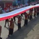 Bendera Merah Putih Sepanjang 100 Meter Dibentangkan di Barangin